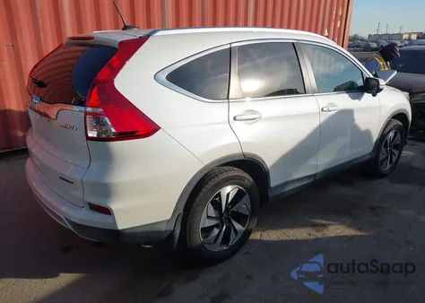 2016 Honda Cr-V Touring z USA, uszkodzony, nr VIN 5J6RM4H93GL109044